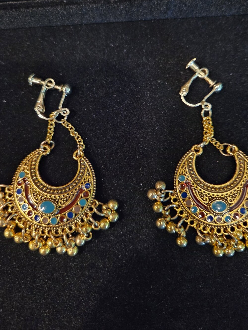 Gold-tone Bohemian Filigree Dangle Clip Earrings with Blue & Red Accents